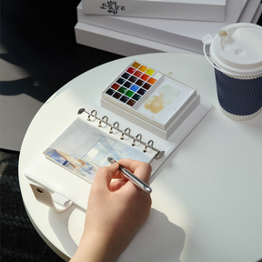 MEEDEN Travel Watercolor Sketchbook Set, 30 Sheets Watercolor Paper, 24 Colors, Brush & Palette